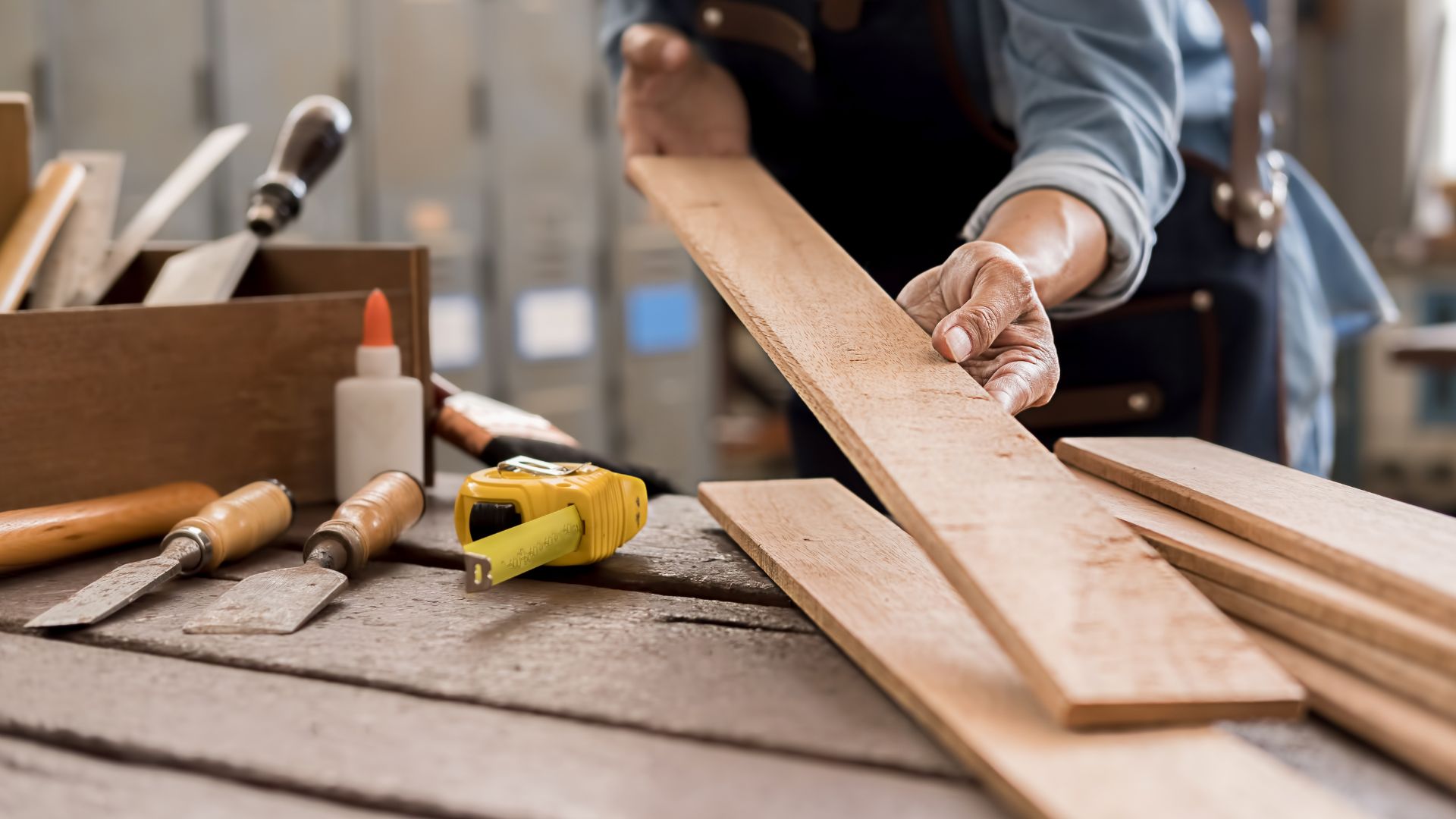 A man working on a piece of wood